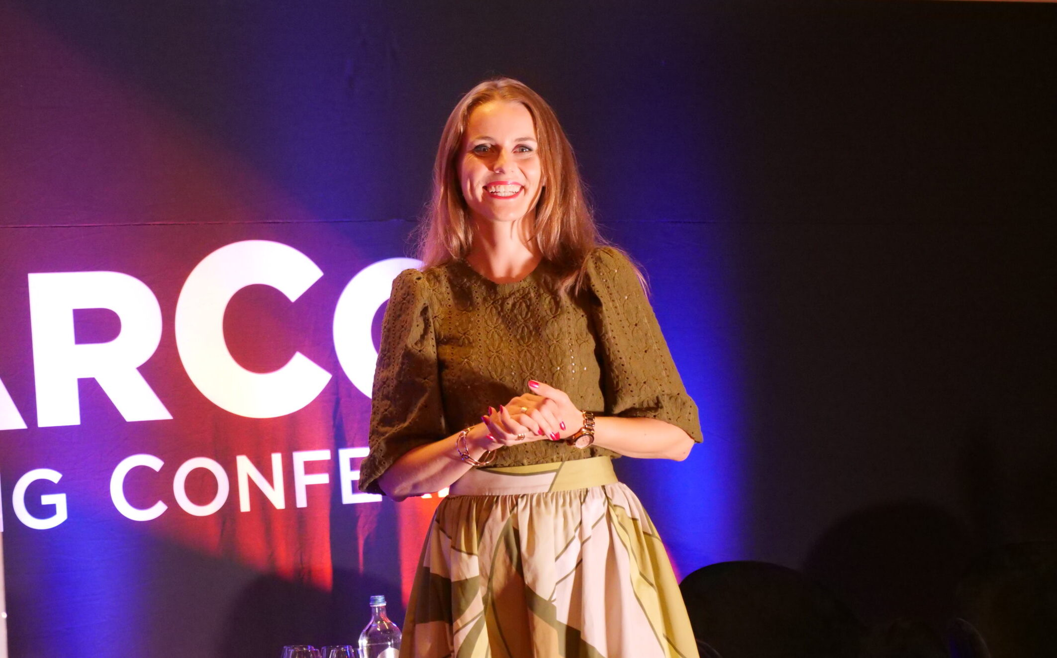 Monika Matuszewska presenting at a conference at ArenA in Amsterdam, the Netherlands.